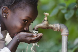 Kid drinking safe water